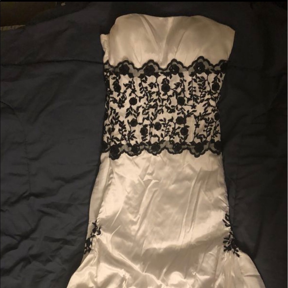 Wedding dress with black floral detail